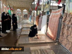 عطر افشانی وگلباران مزار شهدای شهر دزفول توسط پرسنل  و دانشجویان مرکز آموزش عالی حضرت خدیجه کبری(س) به مناسبت 13 آبان 2